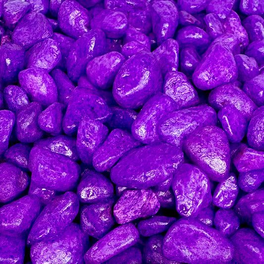 Close-up of purple pebbles with a glossy finish